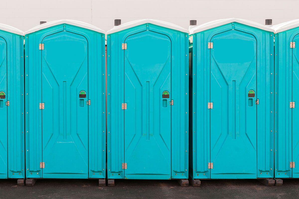 Industrial portable restroom units at a plant in Decatur, Texas